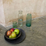 Handblown glass water carafe made from recycled glass. Can be double as vase of cocktail mixer. 