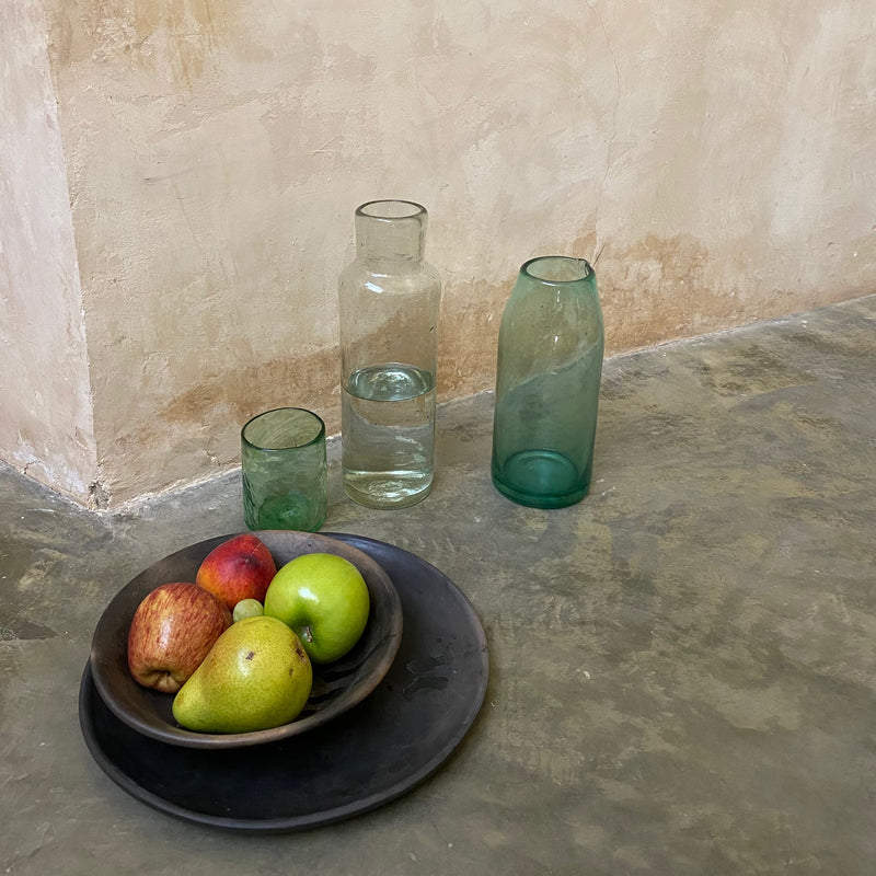 Handblown glass water carafe made from recycled glass. Can be double as vase of cocktail mixer. 