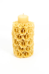 Floral bouquet pillar candle in natural beeswax.  Made by Casa Viviana. 